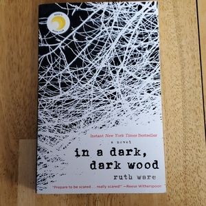 Paperback book In a dark, dark wood